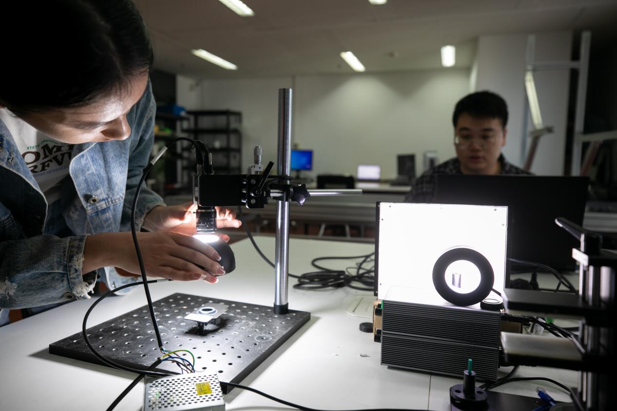 NXHY team testing welding vision equipment